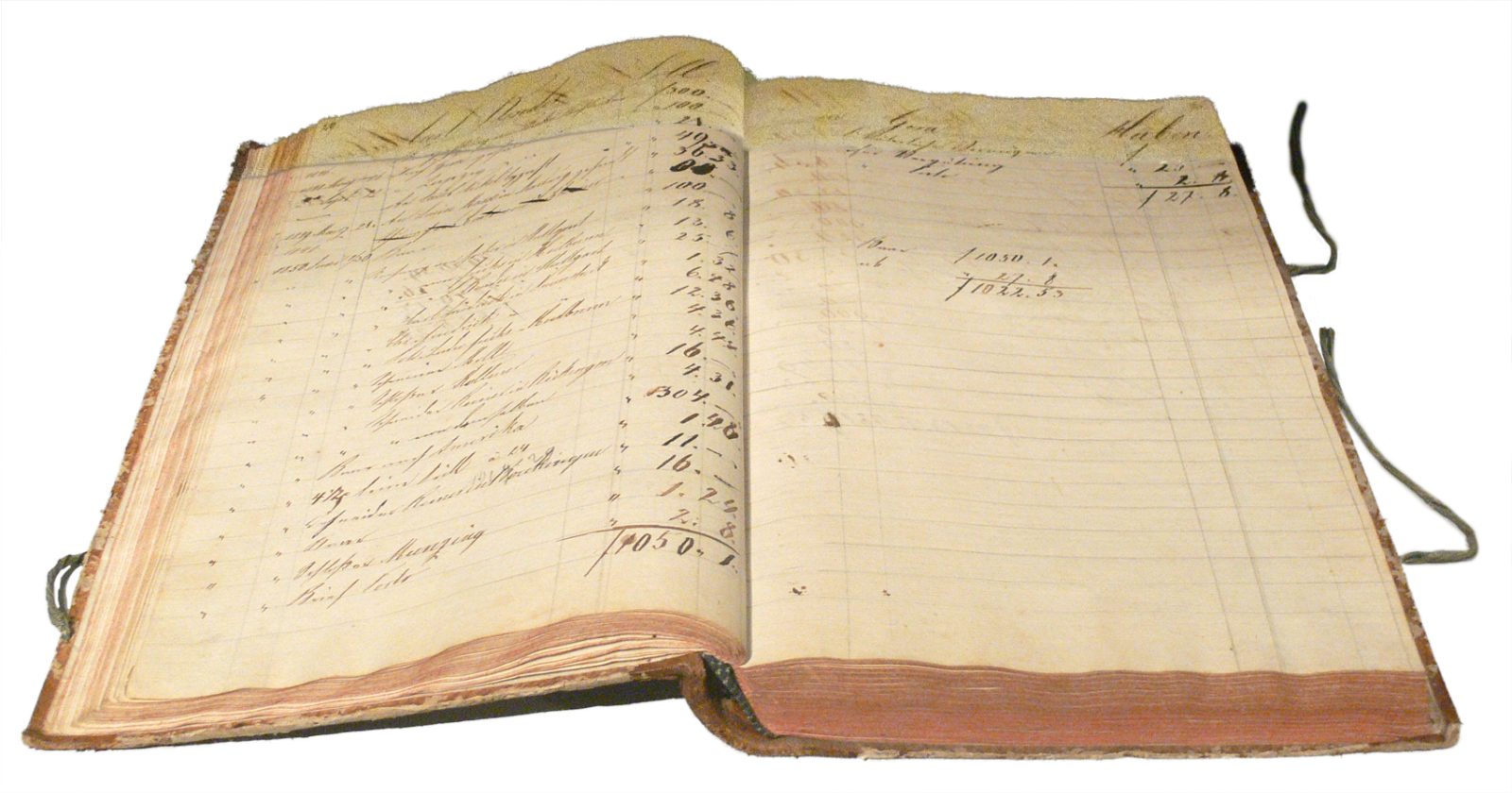 An old handwritten account ledger lying open, with columns of figures totalled by hand